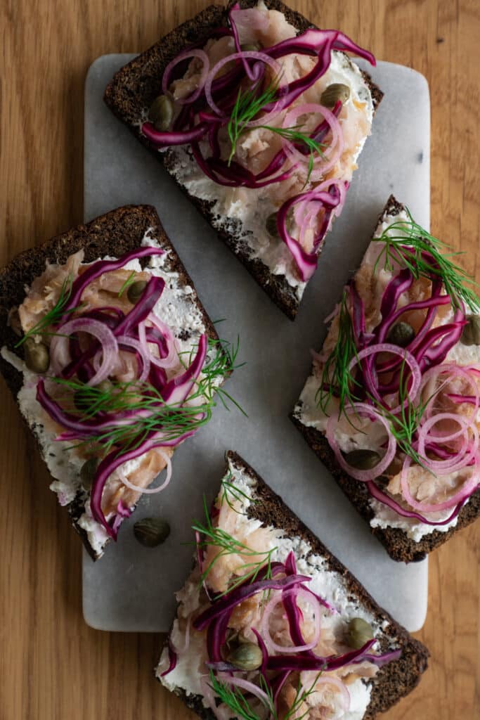 Smørrebrød With Goat Cheese Cream And Hot Smoked Fish