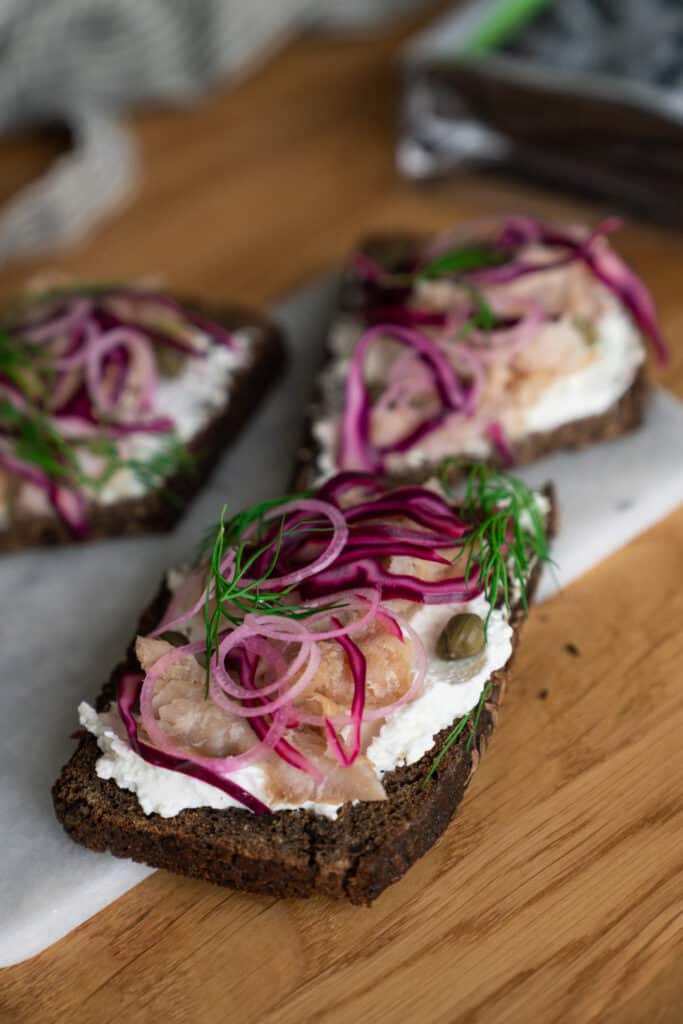Smørrebrød With Goat Cheese Cream And Hot Smoked Fish