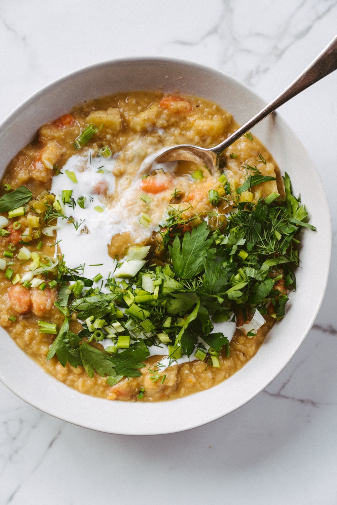 Warming Red Lentil, Potato And Carrot Stew With Fresh Herbs