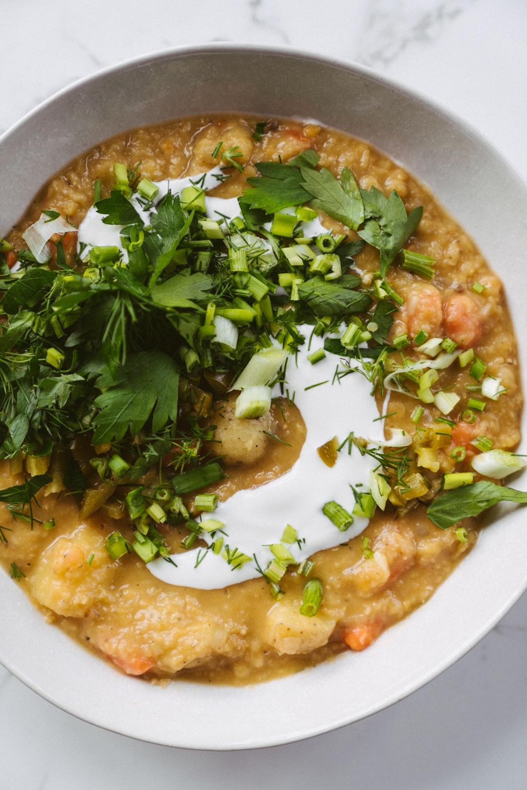 Warming Red Lentil, Potato And Carrot Stew With Fresh Herbs