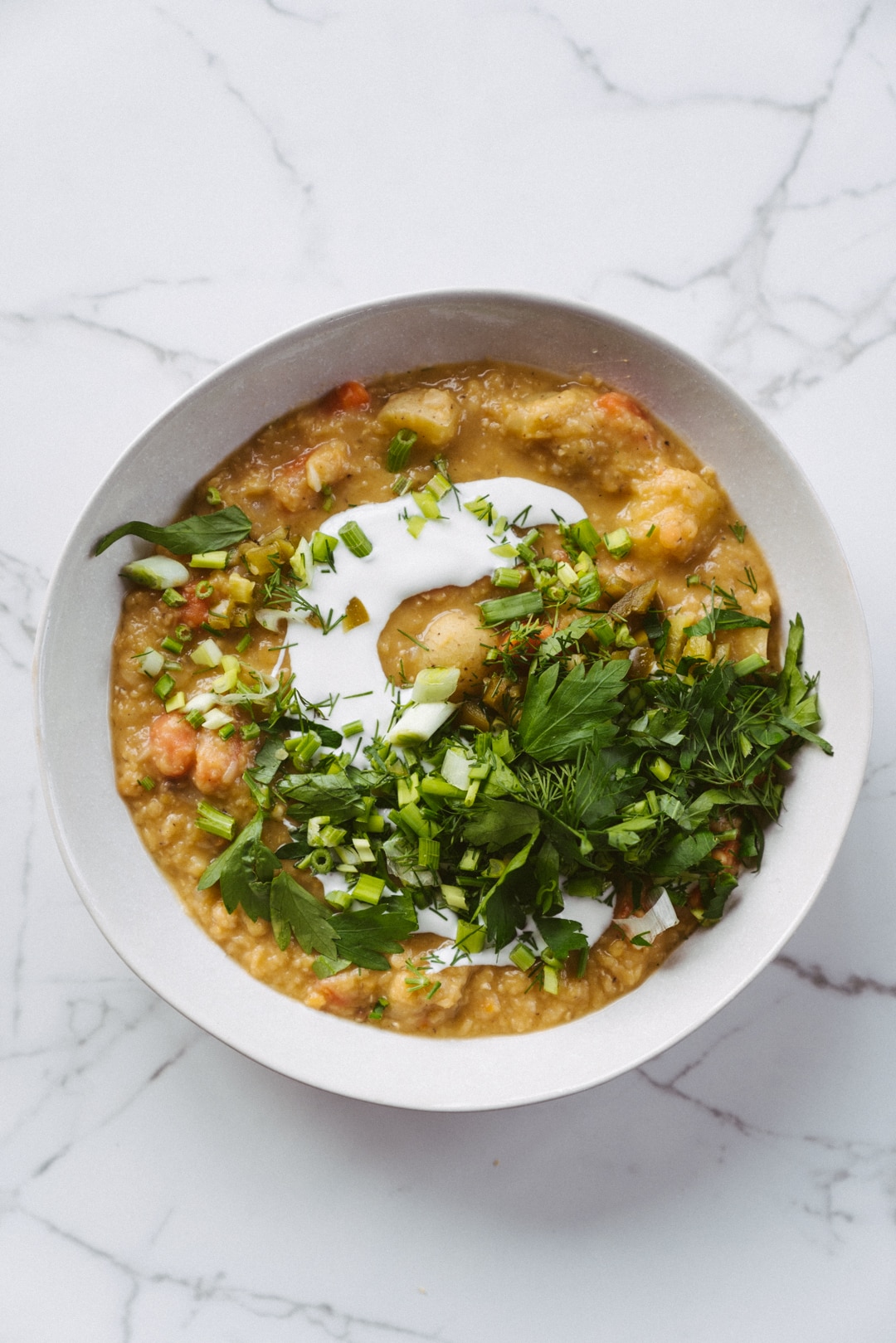 Warming Red Lentil, Potato And Carrot Stew With Fresh Herbs