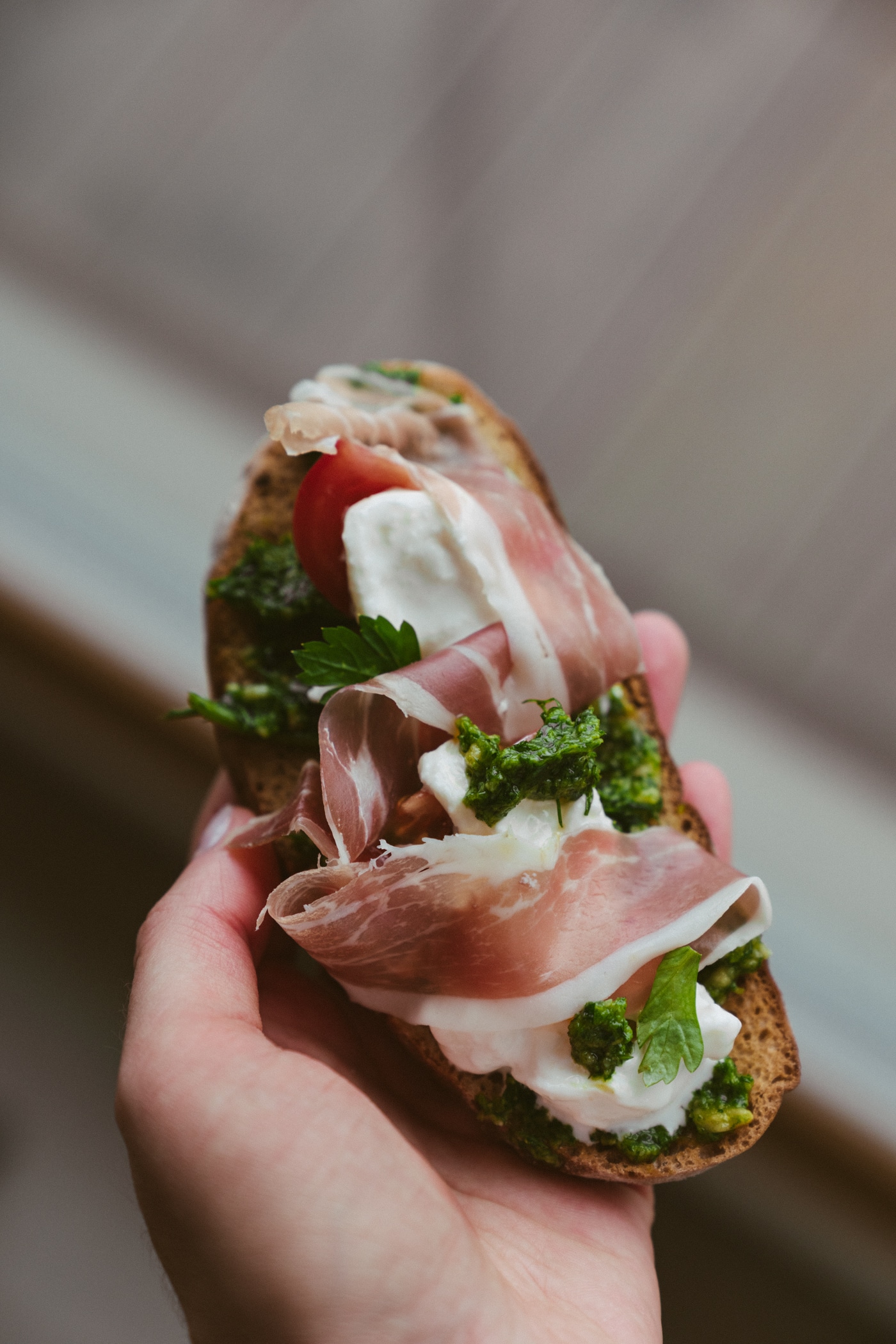 Stracciatella Prosciutto Toasts With Fresh Herb Pesto